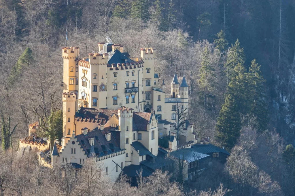 Aerial view of the Hohenschwangau Castle on a sunny day in winter from the Neuschwanstein Castle, Schwangau, Bavaria, Germany