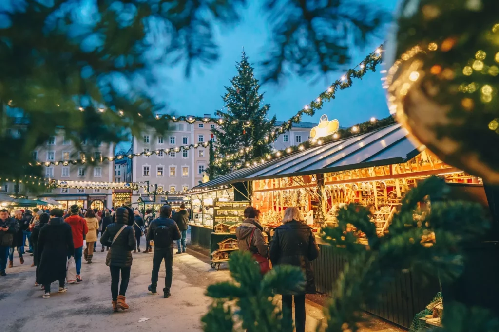 Salzburg Christmas Market seen trough a Christmas tree branches