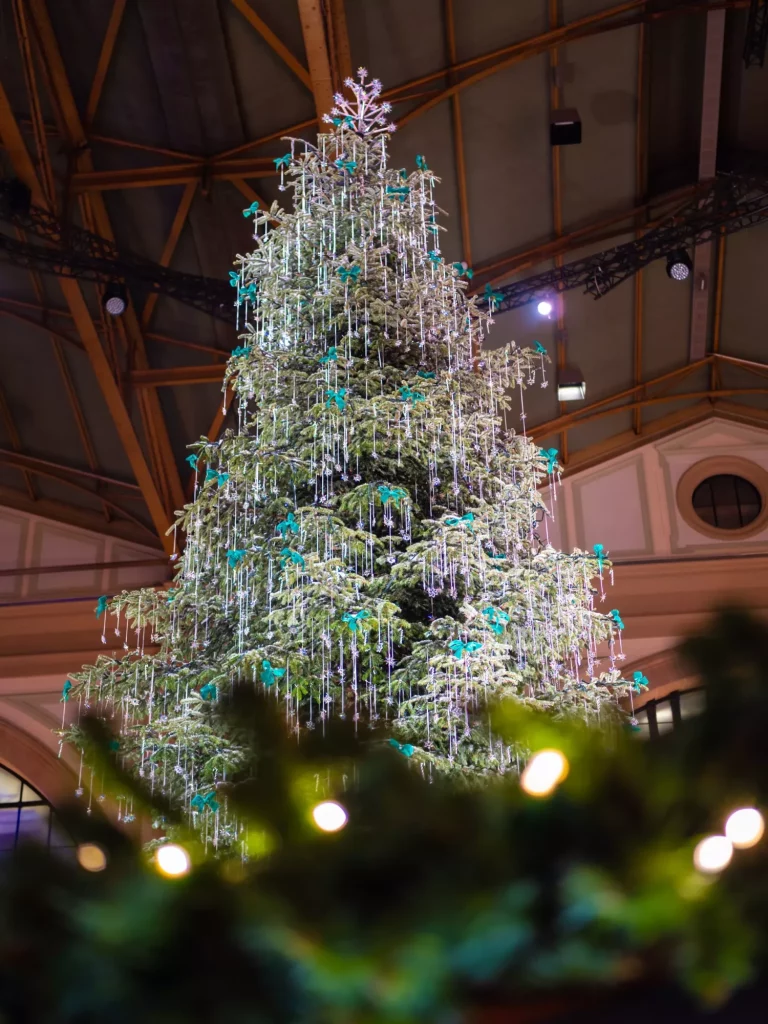 Zurich, Switzerland - November 30, 2021: Traditional Christmas tree at railway station in Zurich